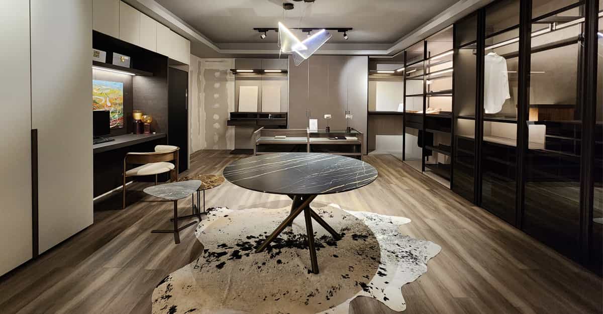 Elegant dining room set featuring a wooden dining table and luxury chairs at FCI London.