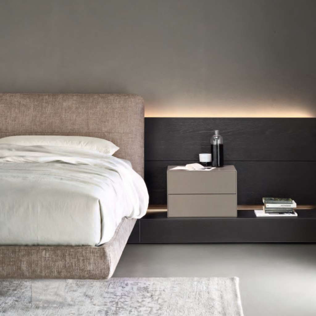 Luxury bed with a backlit headboard and side table