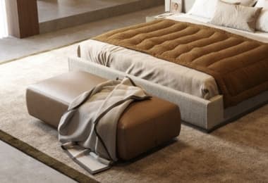 Brown leather upholstered bedroom benches next to bed