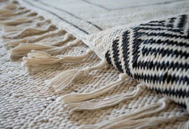 A closer look at black and beige flat weaved rugs