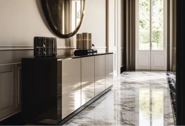 An elegant cream and brown gloss sideboard adding a touch of style to the hallway.