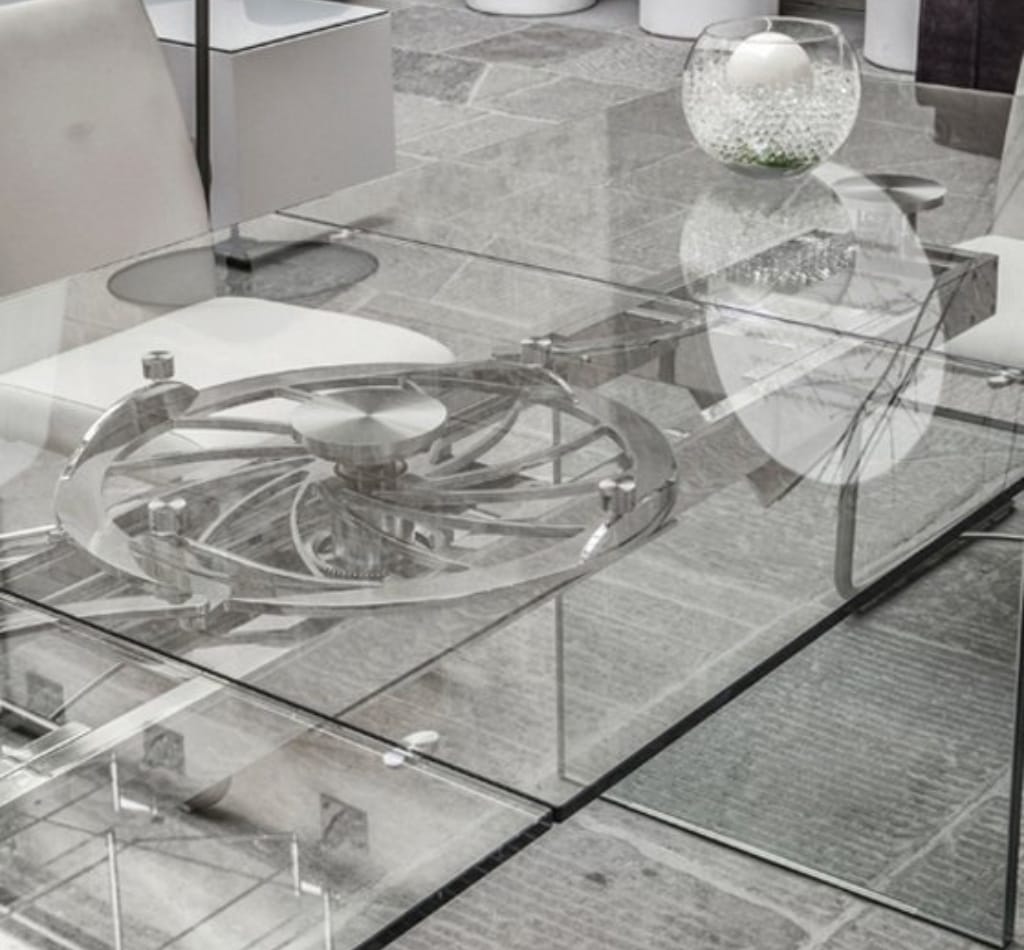 Luxurious clear glass top dining table by Naos