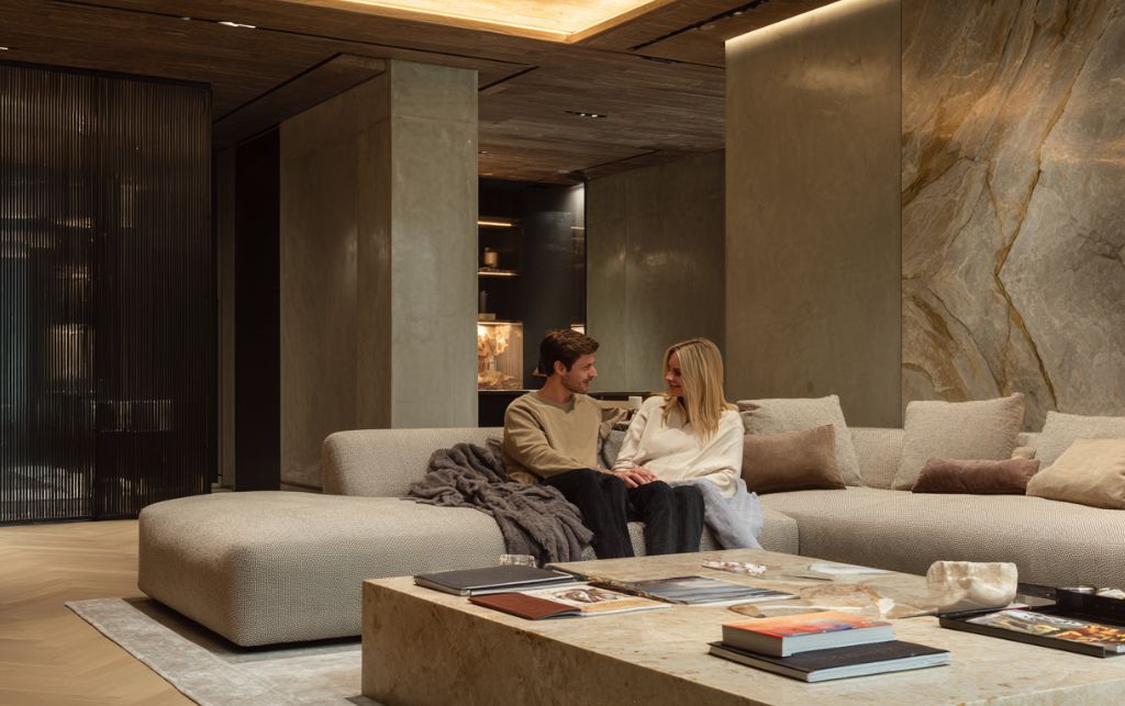 Side by side comparison of leather and fabric sofa textures and finishes