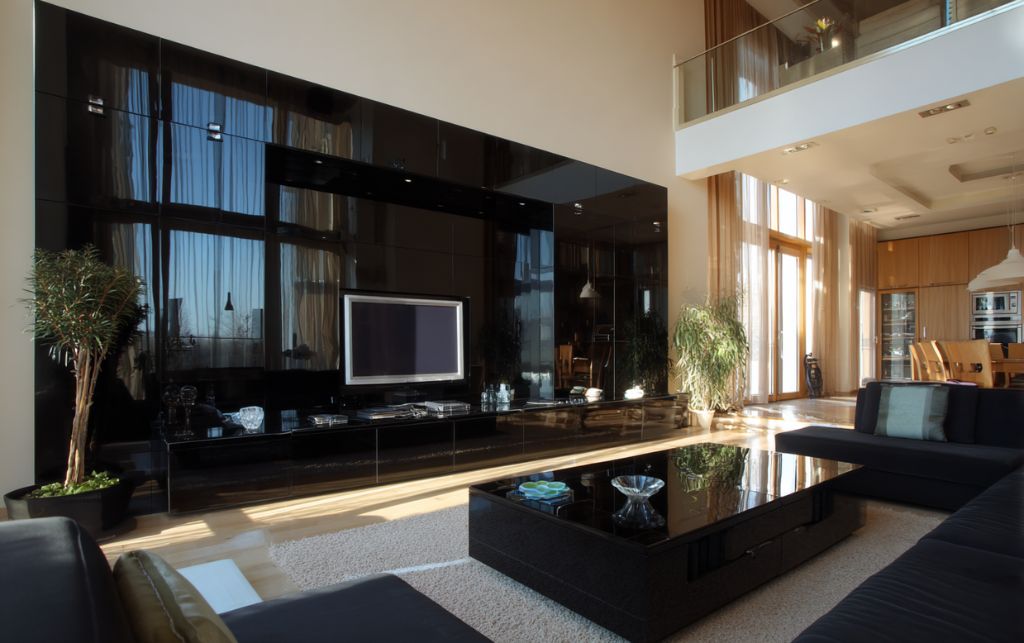 Tall black corner media tower with multiple storage levels